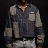 Man wearing a patchwork shirt with 'KEWORLD' branding on a black background